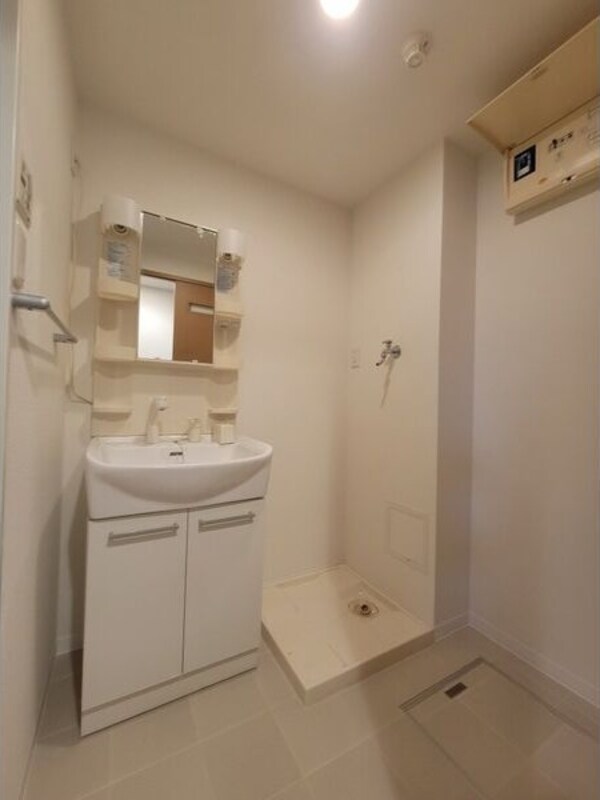 洗面・脱衣所(※写真は同じマンションの違う部屋のものになります。)