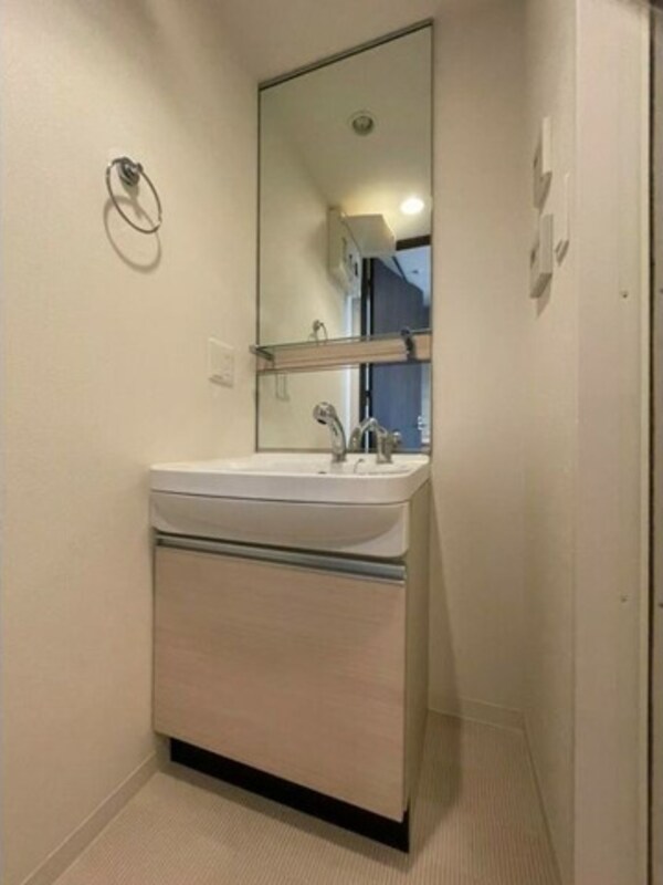 洗面・脱衣所(※写真は同じマンションの違う部屋のものになります。)