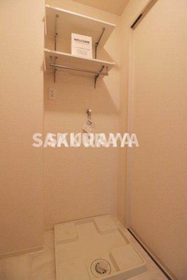 洗面・脱衣所(2022年撮影。現況と異なる場合がございます。)