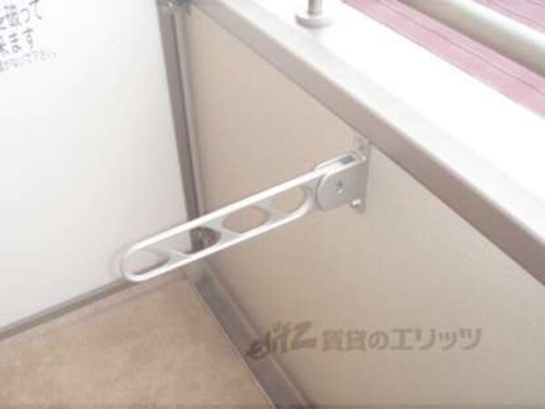 物干竿架け