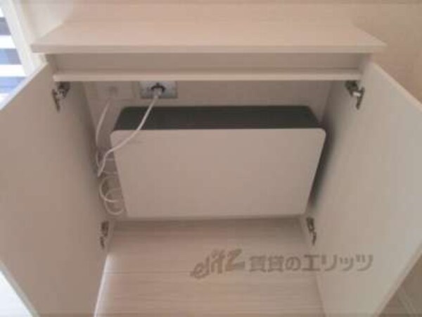 蓄電器