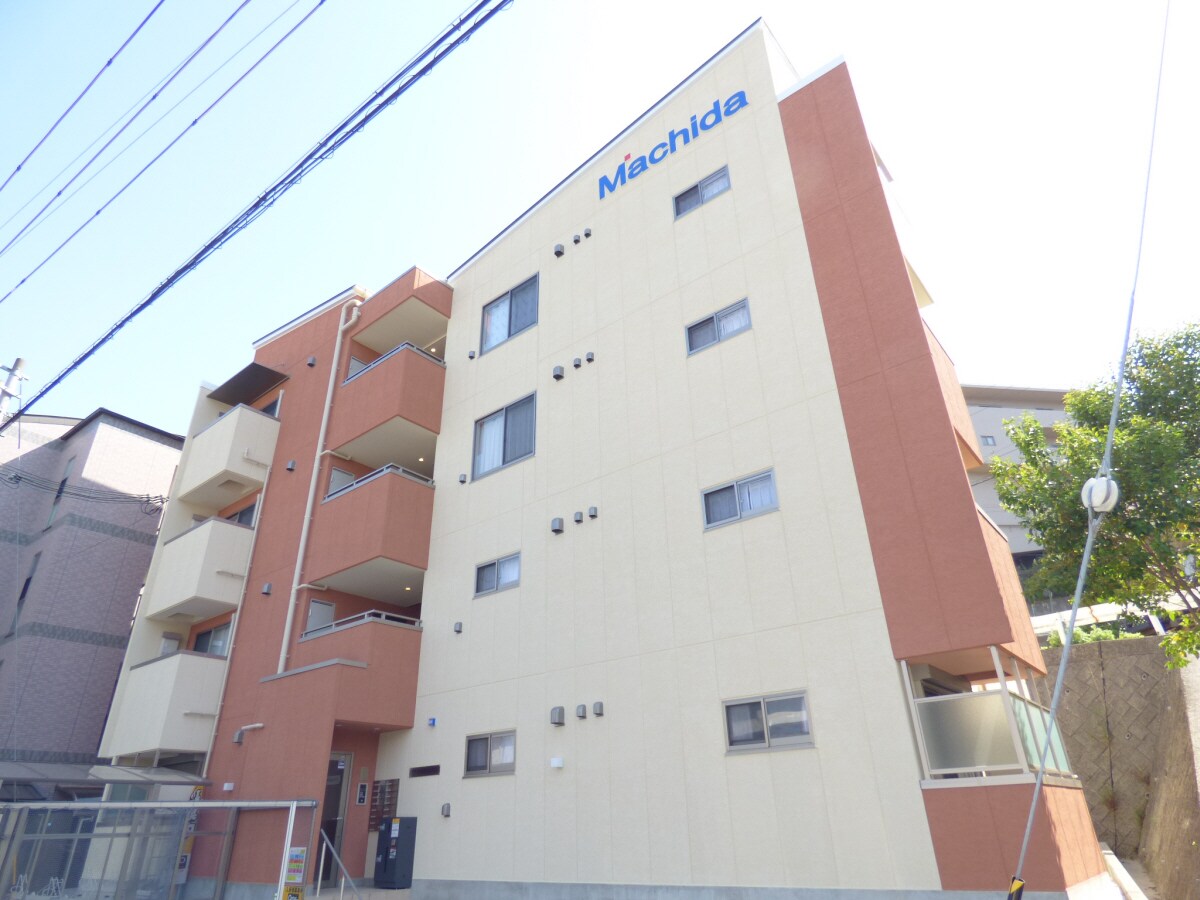 物件外観写真1　(２４時間セキュリティシステム採用の新築マンション)